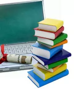 laptop and books for training and learning